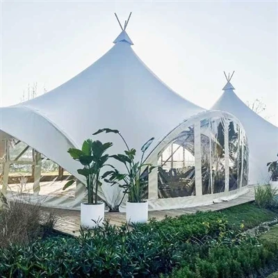 What advantages does the hotel tent, equipped with a private bathroom, offer to the campsite? What advantages does the hotel tent, equipped with a private bathroom, offer to the campsite?